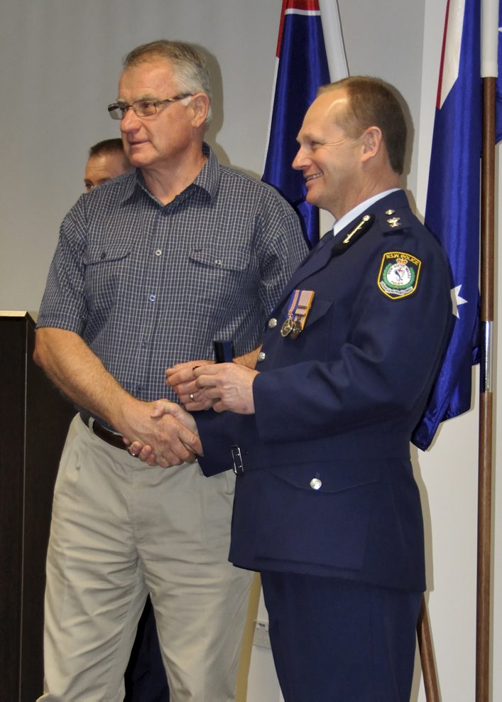 Photo by Cal THURSDAY 6 SEPTEMBER 2012 THE INAUGURAL RETIRED POLICE PIN CEREMONY AT OAK FLATS ( WARILLA ) ( LAKE ILLAWARRA ) POLICE STATION. RETIRED POLICE RECEIVING THEIR PINS AS A MARK OF RESPECT FOR THE COMMITMENT TO POLICING SERVICE TO THE COMMUNITY OF NSW. Retired Chief Inspector Peter Lindwall and Supt. Wayne Starling