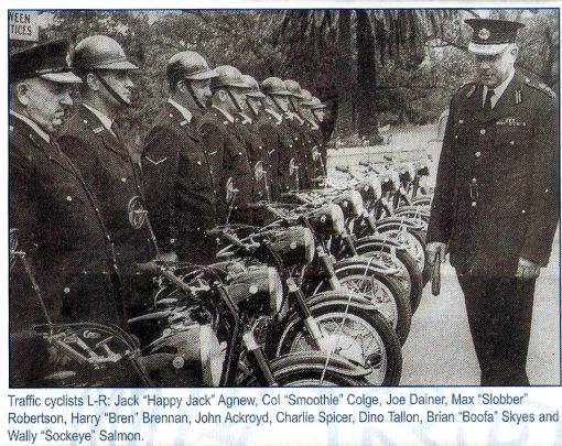 from the late Harry Brennan's memories - via Dave Morris. Appears to be prior to 1968. <strong>Not all names come up in the 1968 ' Stud Book ' </strong>Inscription: Traffic cyclists L - R Jack " Happy Jack " <strong>Agnew</strong> ( NSWPF # ??? ), Col " Smoothie " <strong>Colge</strong>, Joe <strong>Dainer</strong>, Max " Slobber " <strong>Robertson</strong>, Harry " Bren " <strong>Brennan</strong> ( NSWPF # 6424 ), John <strong>Ackroyd</strong>, Charlie <strong>Spicer</strong> ( NSWPF # 7263? ), Dino <strong>Tallon</strong>, Brian ' Boofa " <strong>Skyes</strong> and Wally " Sockeye " <strong>Salmon</strong>. Names are from an article in an old Retired Police Journal by Harry BRENNAN, which featured the photo. I am guessing mid 50's, leather caps have given way to black helmets and BMW's instead of the earlier Triumphs. Looks like Centennial Park - possibly on delivery of the BMW's??? https://www.flickr.com/photos/nswpoliceforce/5599527423/in/photostream/