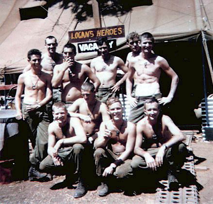 https://www.5rar.asn.au/gallery/thompson-2.htm https://www.5rar.asn.au/gallery/thompson-2.htm<br /> LOGAN'S HEROES<br /> NUI DAT 1969<br /> Members of 2 Section, 2 Platoon, A Company 5RAR, posing for a group photo during a break in patrols and operations.<br /> ( Standing L to R ): Merv Tuckett, Terry Bateman, Vince Fallins, Michael Boulton, Greg Knight and Michael Skelly.<br /> ( Front ): Neville Thompson, John Riley, Norm Carrington and John Logan.