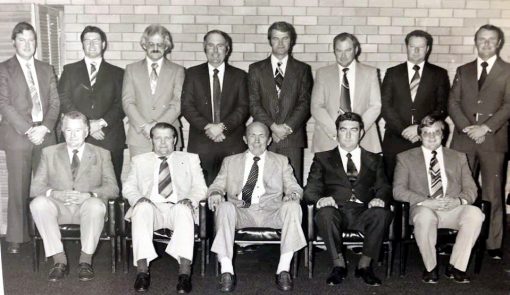 Dubbo Police Administrative District C.I.B. Staff - May 1979 Standing ( L - R ) P.C. Cst 1/c S.T. MARKS ( Stock / CIB - Dubbo ), P.C. Cst 1/c R.J. DUNN ( Dubbo ), DetCst 1/c Paul F. COLE ( Walgett ), Det SenCon M.B. SULLIVAN ( Dubbo ), Det SenCon S.E. KING ( Cobar ), P.C SenCst B.E. PREO ( Walgett ), Det SenCon A.D. DAWSON ( Mudgee ), Det SenCon G.S. HICKEY ( Bourke ) Seated: Det Sgt 3/c L.H. De AUDNEY ( Walgett ), Det Sgt 3.c G.C. ROOSKOV ( Dubbo ), Det Sgt 1/c R.B. KELLY ( Dubbo ), Det Sgt 3/c J.E. HAMPSTEAD ( Mudgee ), Det Sgt 3/c P.J. RANKIN ( Bourke ) Absent: Det SenCon W.A. COLE ( Dubbo ), P.C. Cst K.I. McMAHON ( Policewoman - Dubbo )