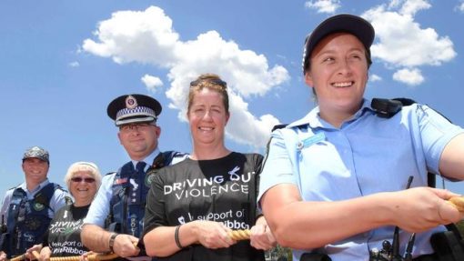 https://www.dailytelegraph.com.au/newslocal/macarthur/white-ribbon-day-convoy-travels-through-campbelltown-and-macquarie-fields-to-stop-domestic-violence/news-story/2bb61fc59b42b8c2e4cf120c36cc6111 Elise Marie CARTER nee Elise MONJO, Elise CARTER, Grommy. Senior Constable Elise Carter (front), joins Lisa Brown from YOTS, Inspector Paul Kremer, Luanda Martin from YOTS and Senior Constable Troy Lewis during the White Ribbon Day convoy’s tug of war at Campbelltown Sports Stadium. Picture: Simon Bullard