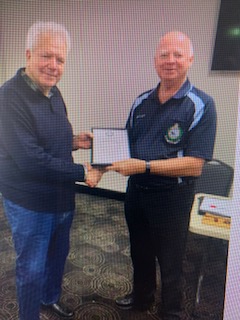 Image courtesy of Geoff Talbot Gerry Wall receiving his OBE ( Over Bloody Eighty ) certificate from Geoff Talbot