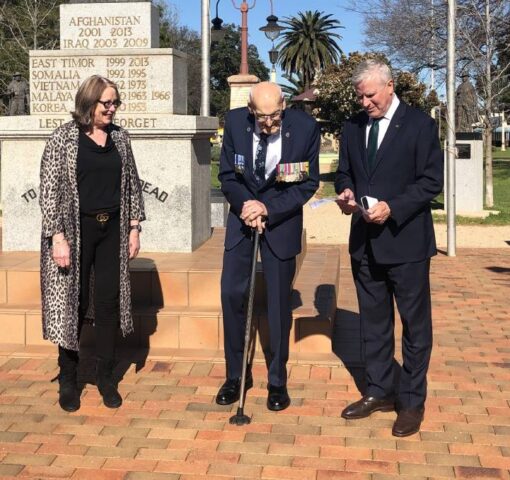 Deputy Prime Minister Michael McCormack presented Harry Coggan with a special commemorative medallion for his service. Photo supplied.
