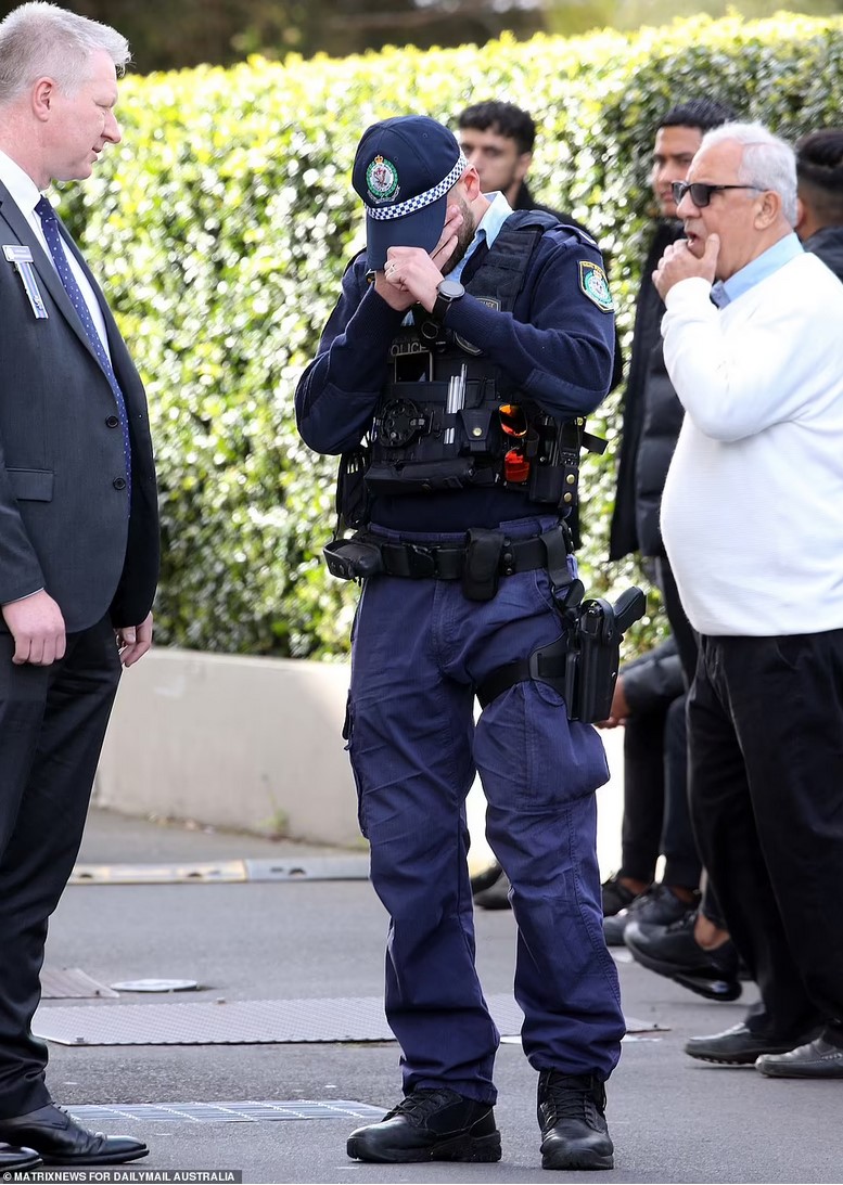 Constable Berkay Tustas (above) was inconsolable at the service. He had graduated from the NSW Police Academy with Constable Bashir in 2019