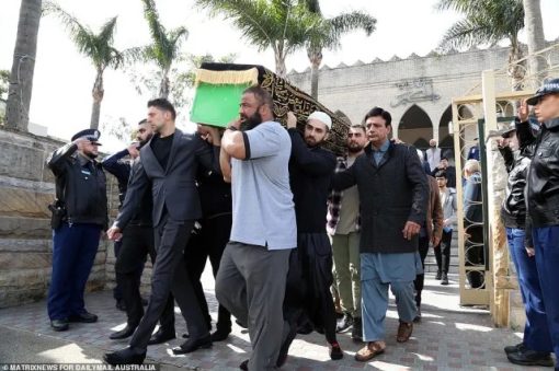 Tanzeel Iftikhar BASHIR. Constables are pictured saluting as the coffin was carried out.