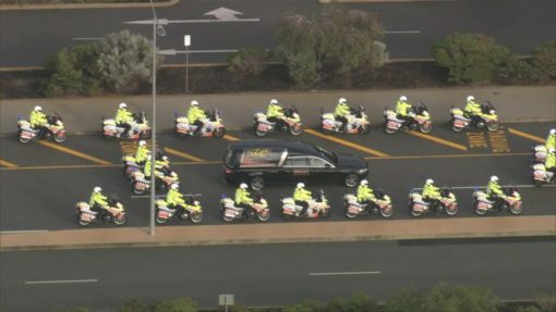 https://7news.com.au/news/perth/thousands-gather-for-funeral-of-police-officer-anthony-woods-in-perth-c-11191720 The service concluded with a police honour guard. Credit: 7NEWS