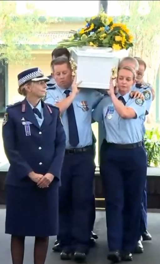 Joanne Katherine TRAVERS AKA  Joanne Katherine ELDER. Police Chaplin - Reverend Susan AVERY leading Jo's coffin at the completion of Jo's Service.